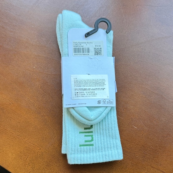 NWT lululemon athletica Unisex Crew Light blue with green writing Casual Socks - Picture 2 of 5